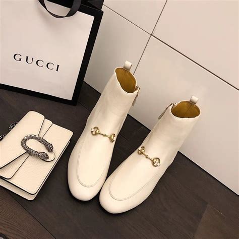 embroidered leather ankle boot with belt gucci fake|gucci jordaan leather ankle boots.